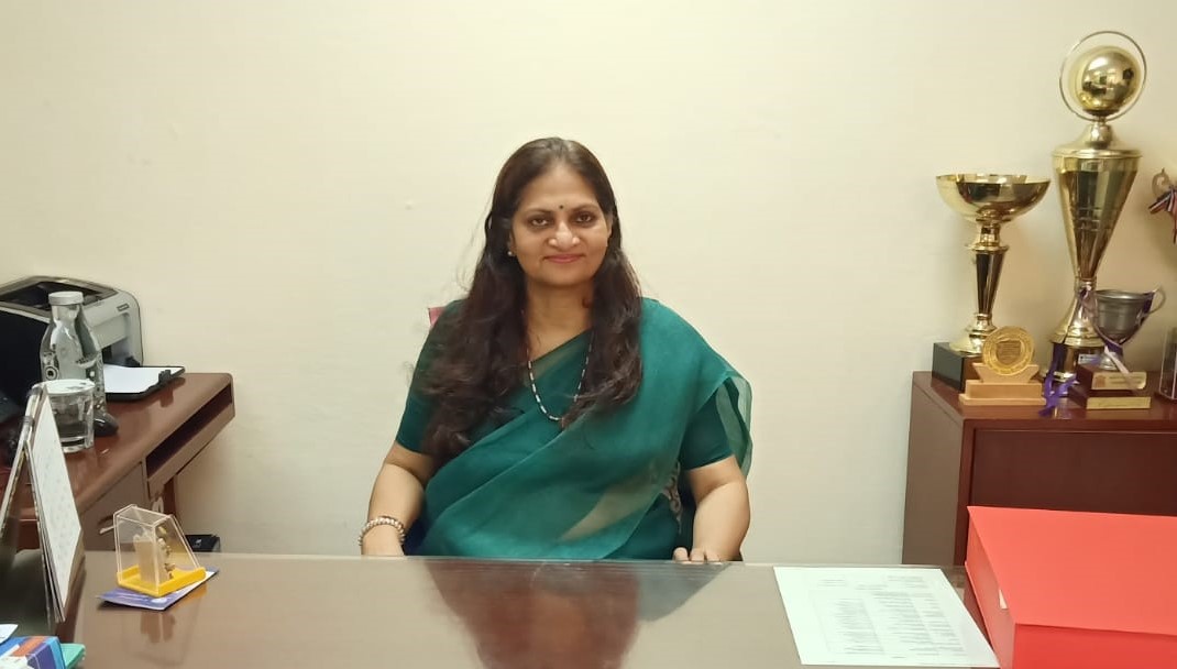 Photo of Dr. Kavita Verma, the senior school incharge, sitting in her office
